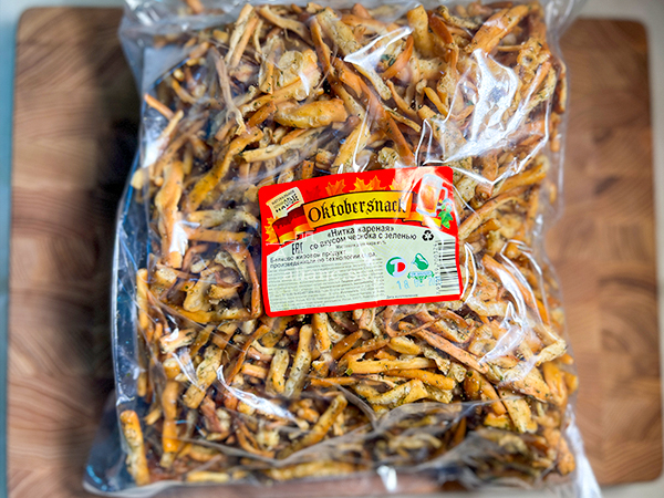 Нитка ЖАРЕНАЯ "Чеснок с зеленью" Oktobersnack 1 кг (сырный продукт) в Видном